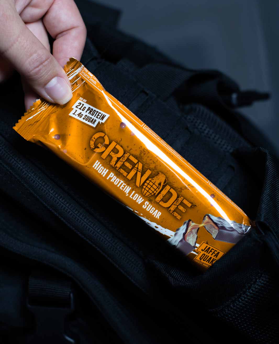 Grenade Orange Protein Bar on the go
